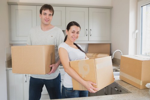 Local moving van transporting household items across Ruislip